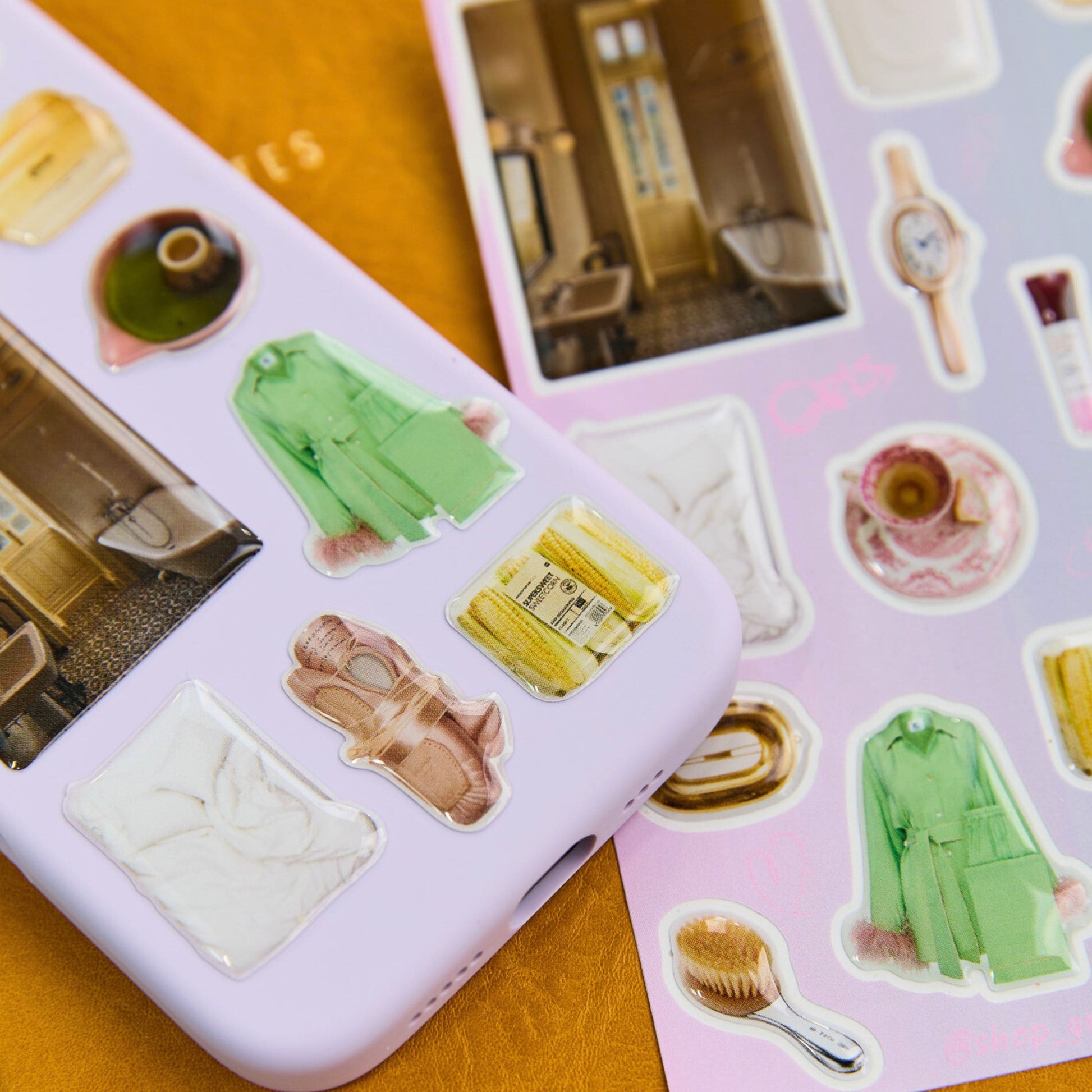 Phone case with glossy domed stickers 