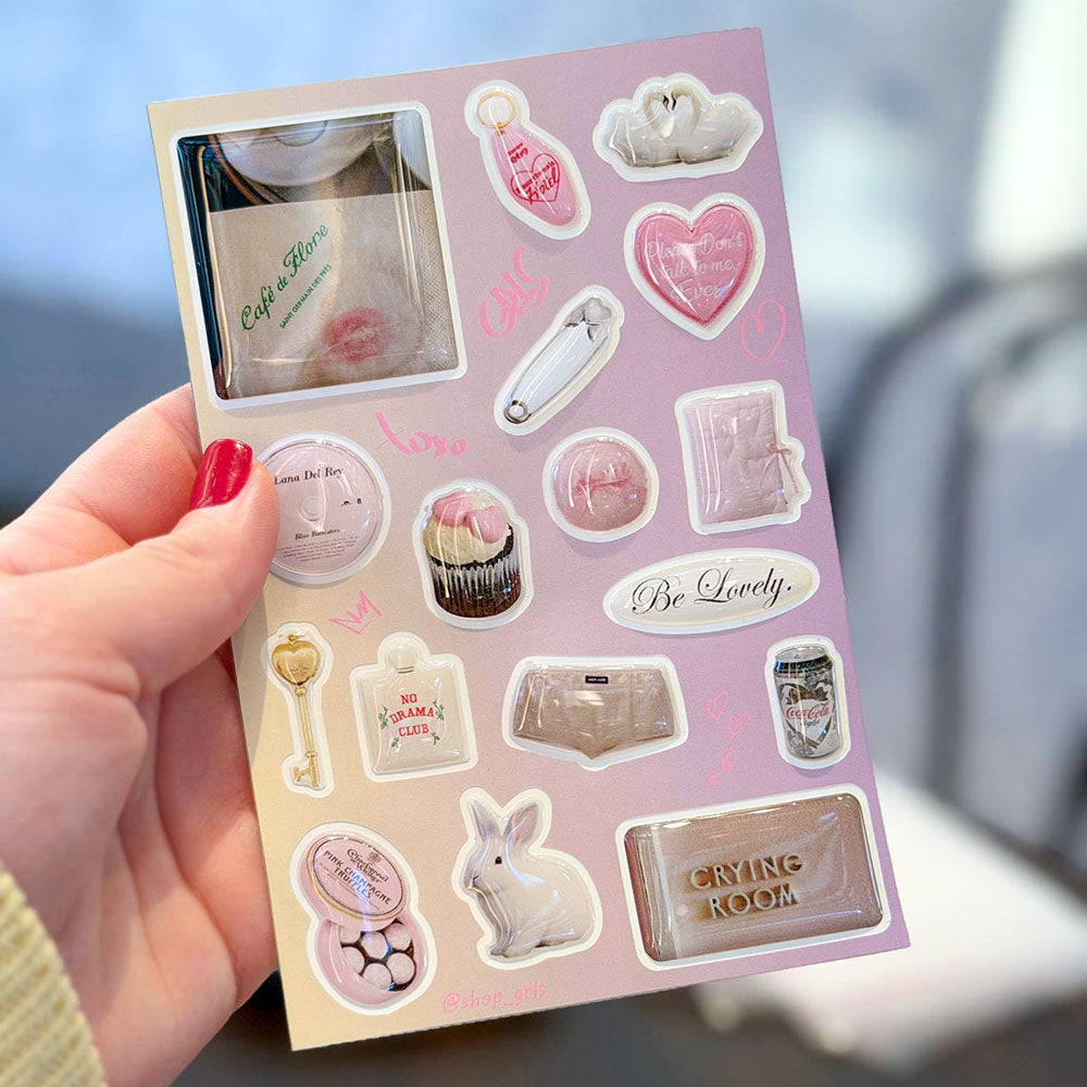 No Drama Club | An exclusive set of 3D jewelry emblems for the modern romantic. Hand-finished with a signature glass-like gloss, featuring iconic charms: the golden key, serene white swans, and our namesake 'No Drama' elixir. A tactile statement of irony and elegance.